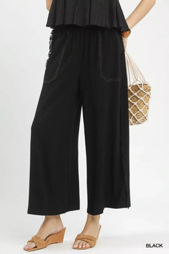 Umgee Linen Frayed Side Pocket Wide Leg Pants with black wide-leg design, white stitching and beaded trim