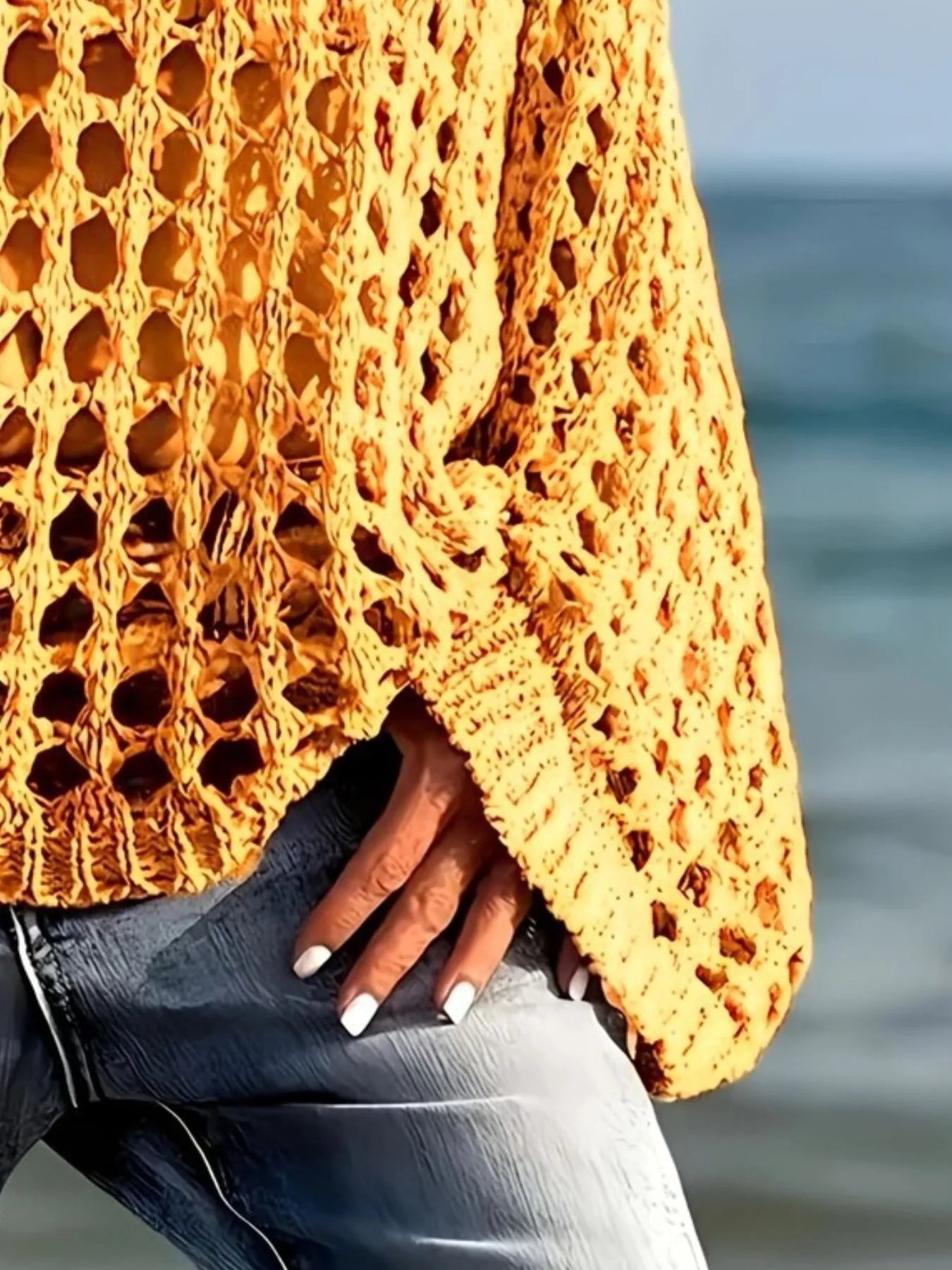 Vibrant yellow crochet long sleeve knit cover up with honeycomb pattern