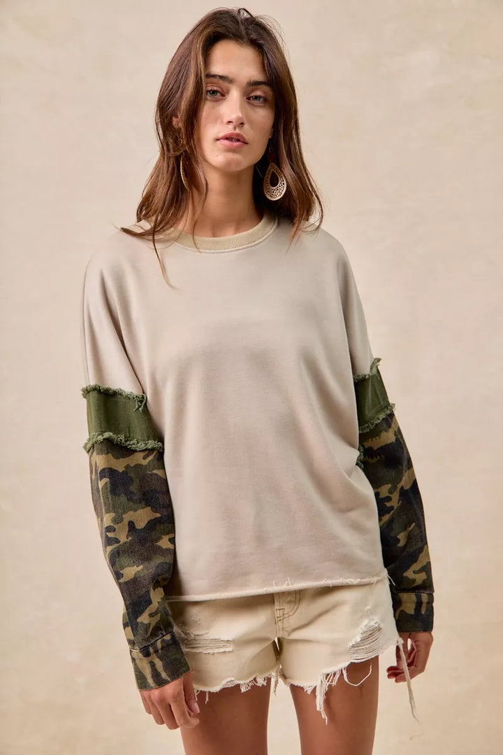 BiBi Camo Sleeve French Terry Top with Frayed Edge | Daverri Fashions