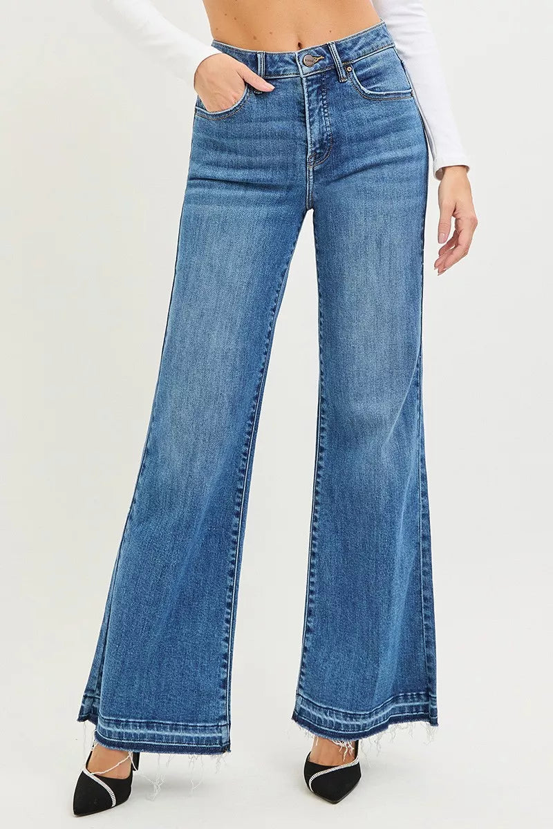 RISEN high-rise blue denim flare jeans with frayed hems