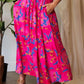 Vibrant pink Davi & Dani printed smocking waistband ruffled maxi skirt with blue and yellow accents