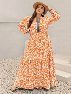 Plus size boho floral print maxi dress in orange and white with silver beaded neckline
