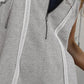 Gray heathered sleeveless half-zipped hooded romper with white stitching