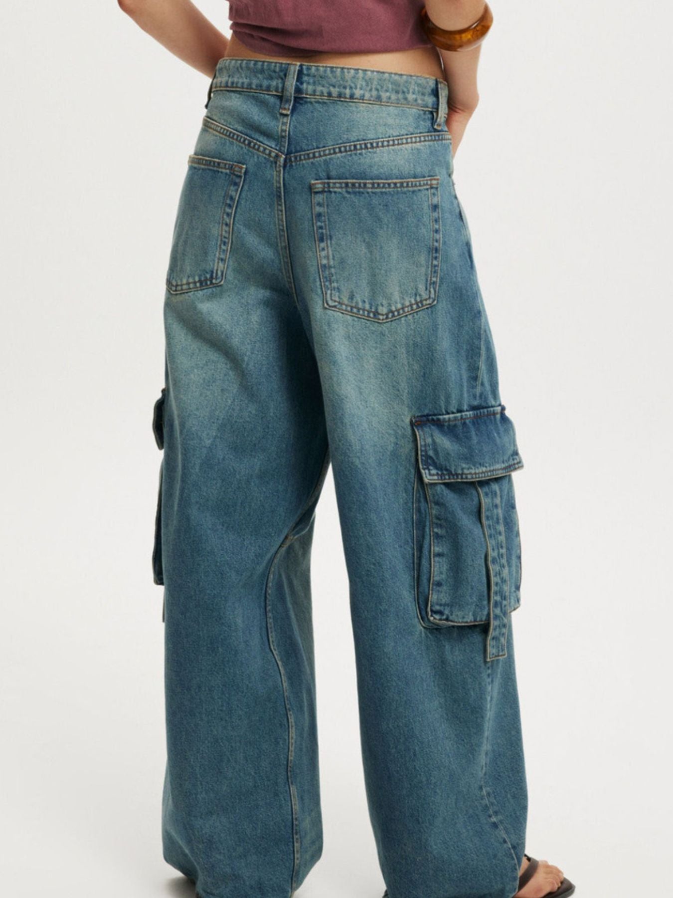 Vintage Wash Wide Leg Cargo Jeans in medium-wash blue with flap pockets
