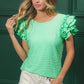 Mint green BiBi Birdseye texture layered ruffle top with short sleeves