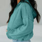 Teal mineral wash baggy hoodie for women with half zip and kangaroo pocket