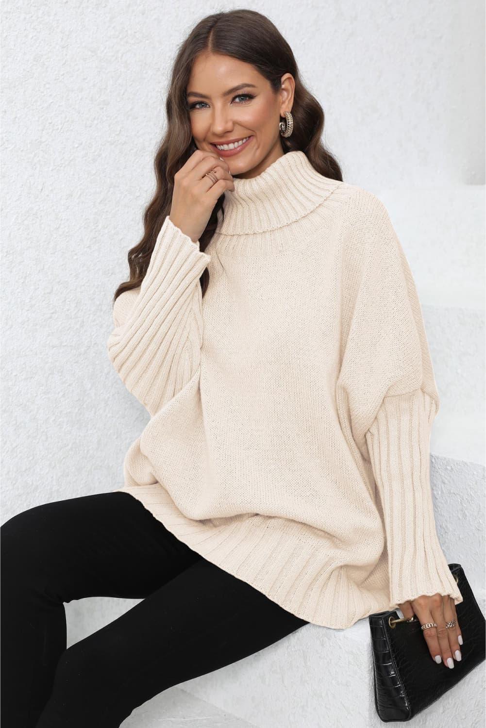 Beige cable knit turtleneck sweater with bell sleeves