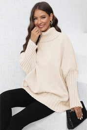 Beige cable knit turtleneck sweater with bell sleeves