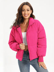 Hot pink zip-up turtleneck puffer jacket with hood