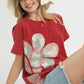 Red Umgee mineral wash French terry top with pastel flower patchwork