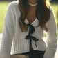 White Tie Front Knit Cardigan with black bow detail