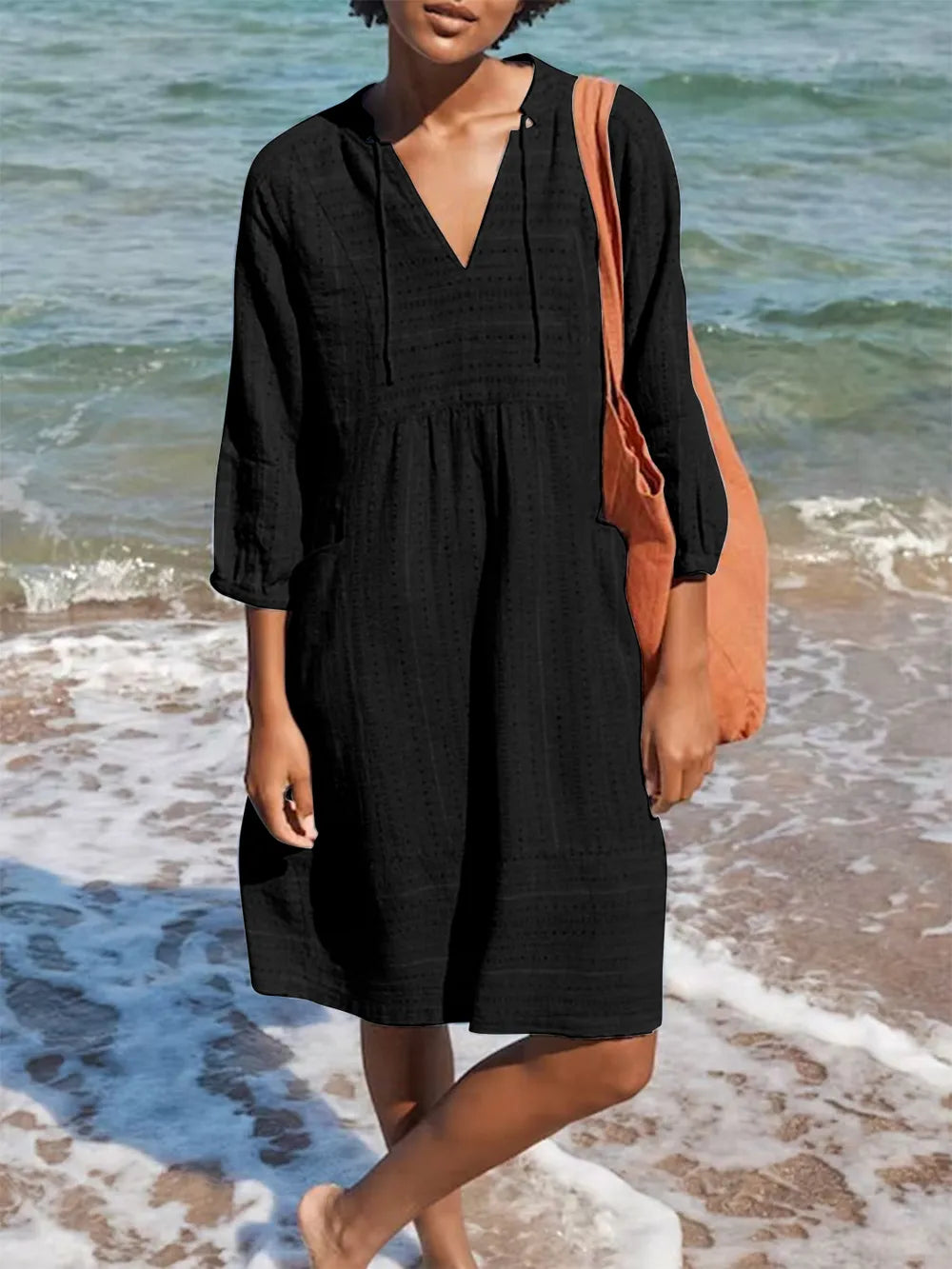 Black linen V-neck mini dress with three-quarter tied sleeves