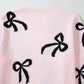 Bow Pattern Round Neck Loose Fit Sweater - DAVERRI FASHIONS