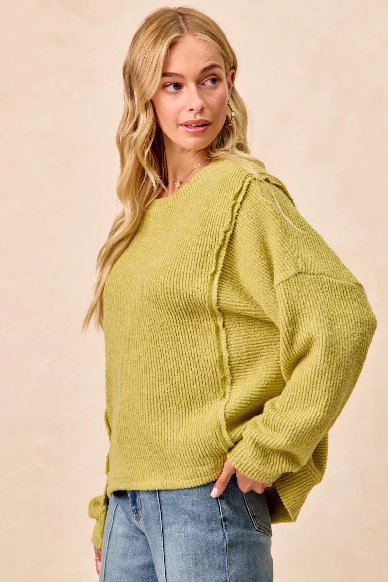 Cozy olive-green BiBi Boucle rib knit sweater with uneven hem