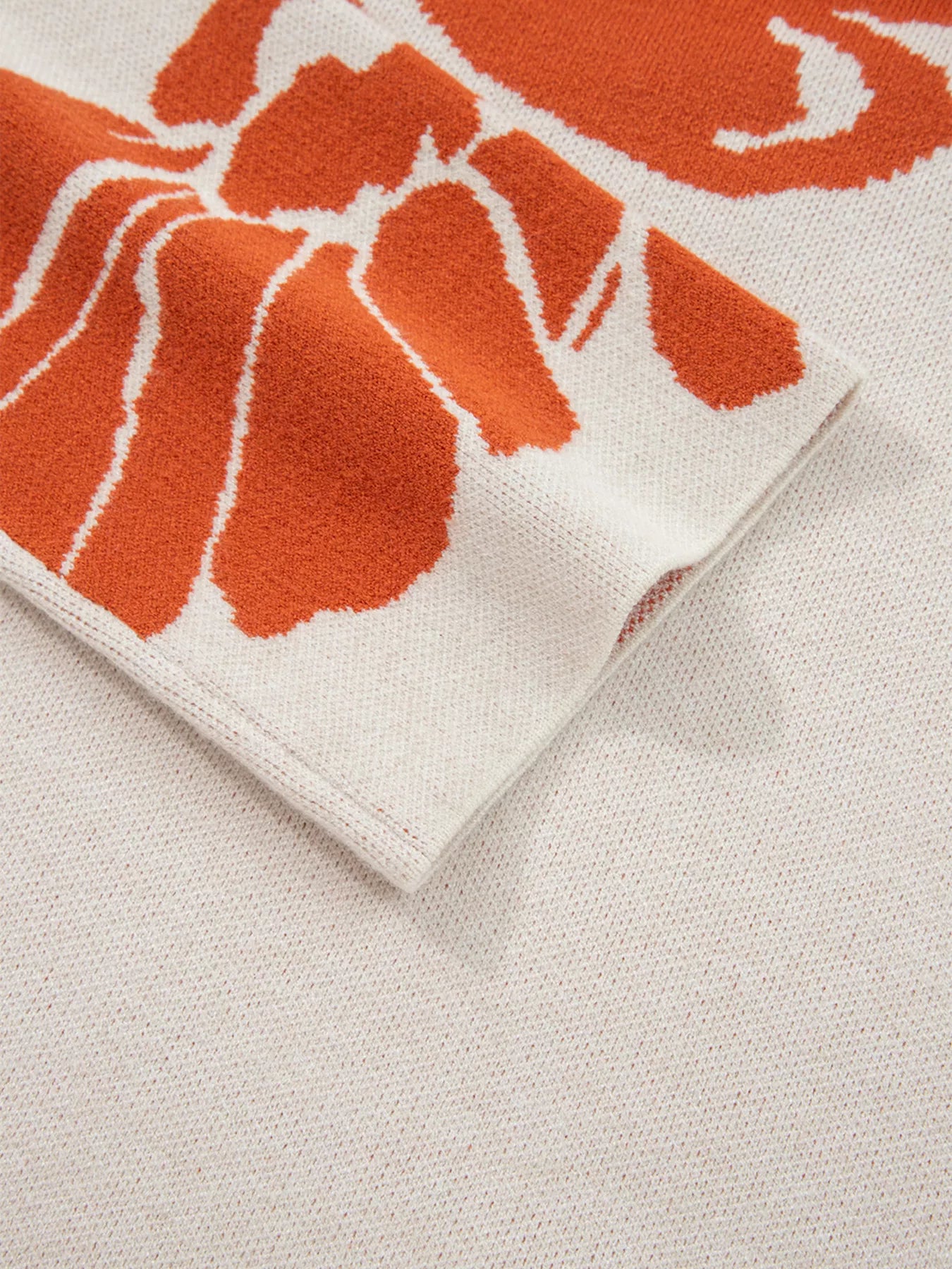 Boho flower pattern oversized knit sweater in cream with orange floral design