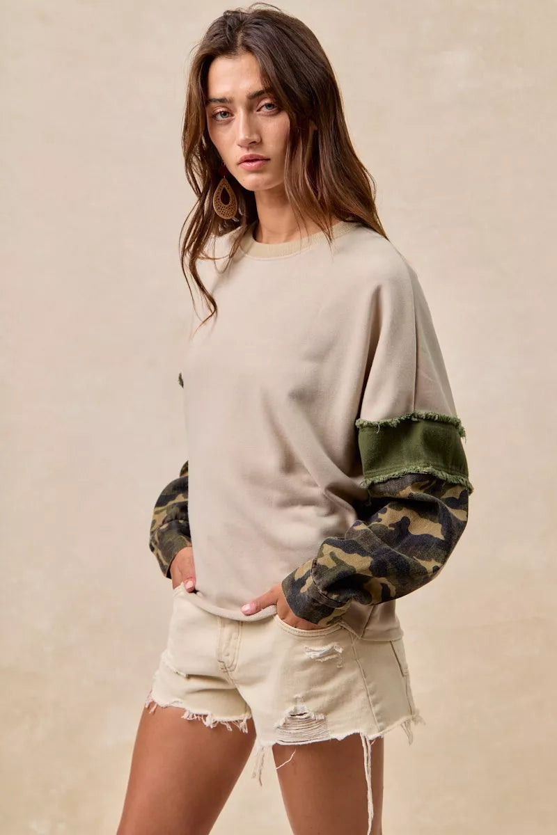 BiBi Camo Sleeve French Terry Top with Frayed Edge | Daverri Fashions