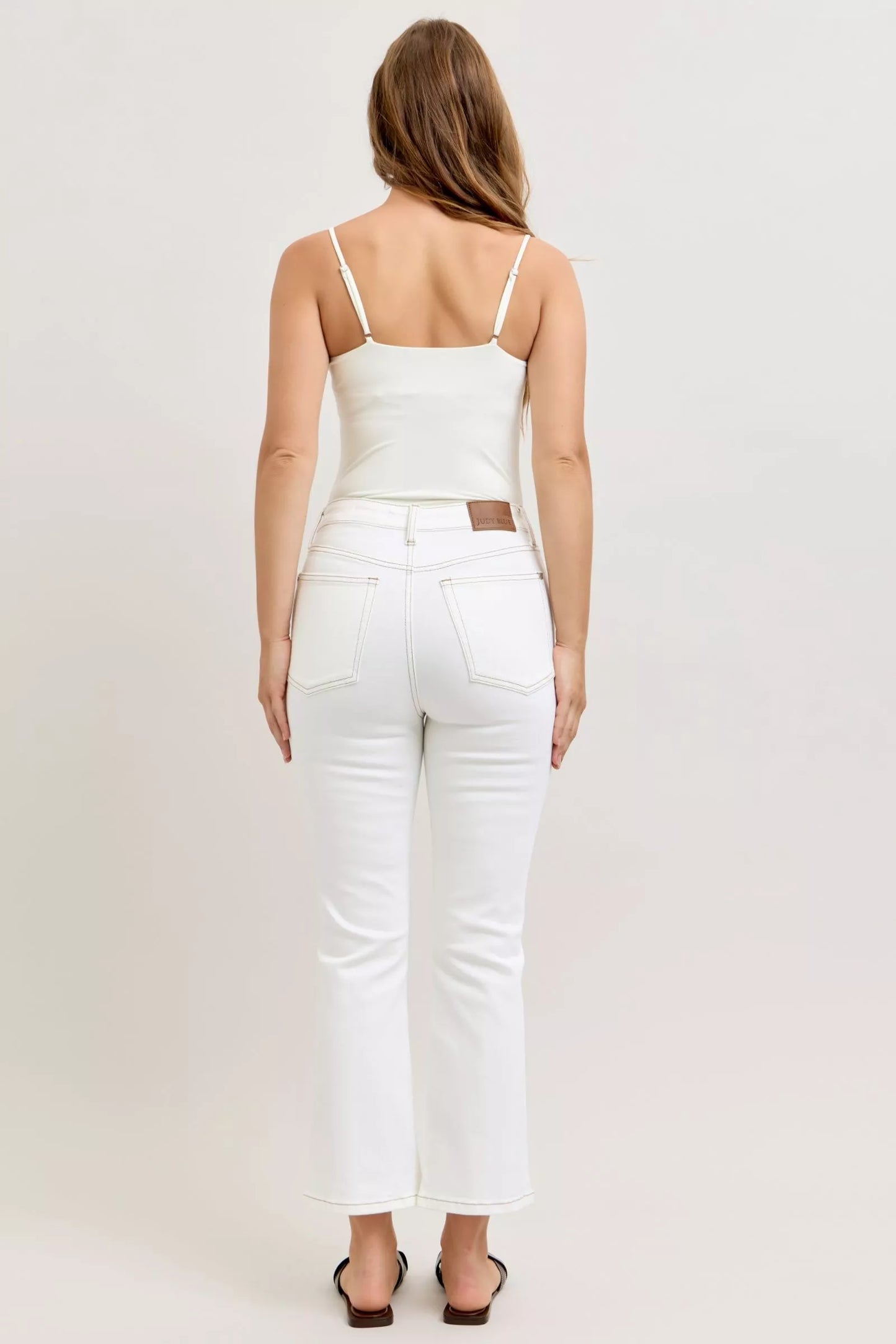 Judy Blue white high-rise cropped flare jeans with brown leather patch