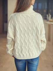 Cream cable-knit turtleneck sweater with long sleeves
