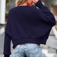 Navy blue cropped drop shoulder round neck long sleeve sweater with ribbed cuffs and hem