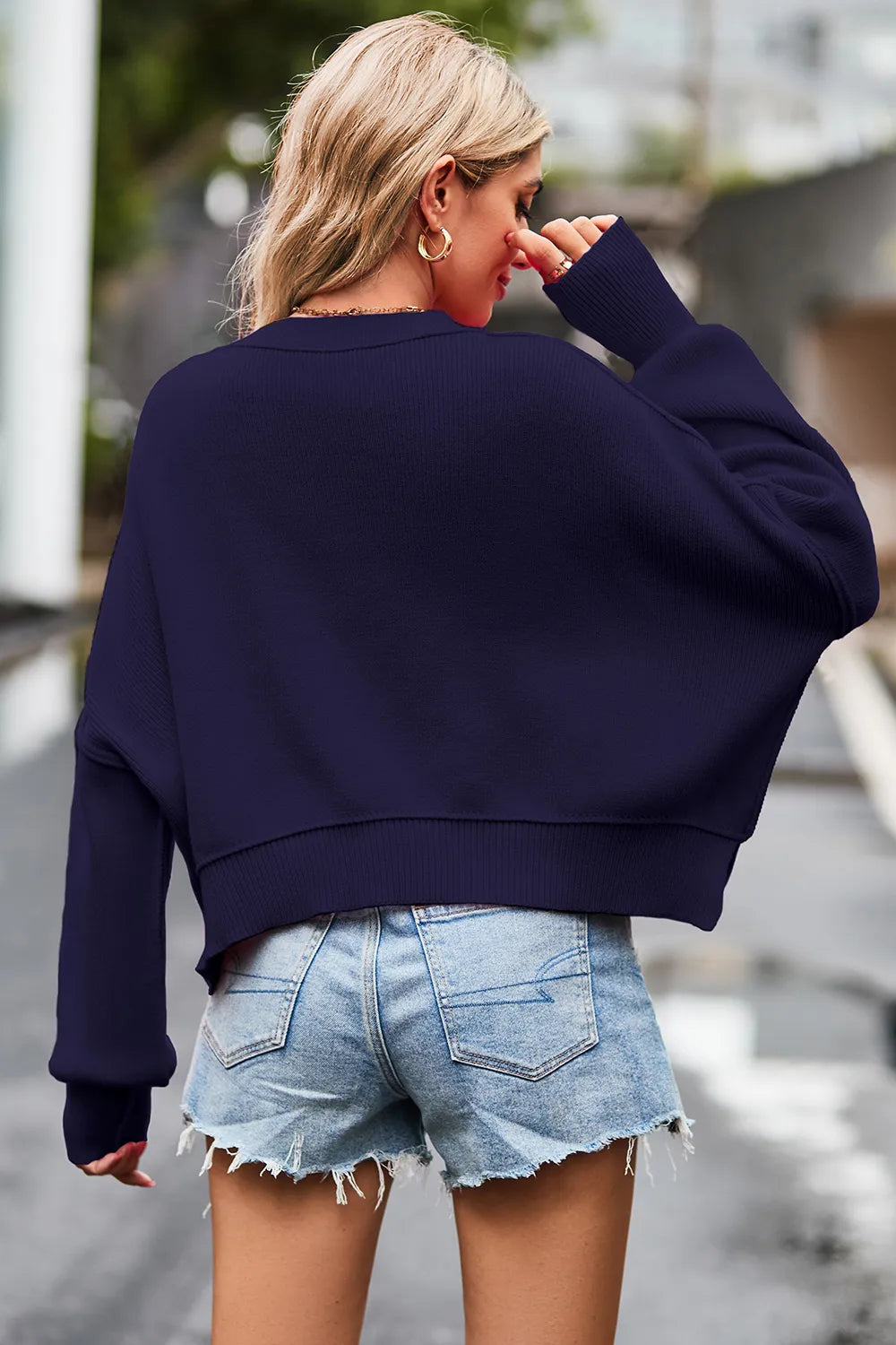 Navy blue cropped drop shoulder round neck long sleeve sweater with ribbed cuffs and hem