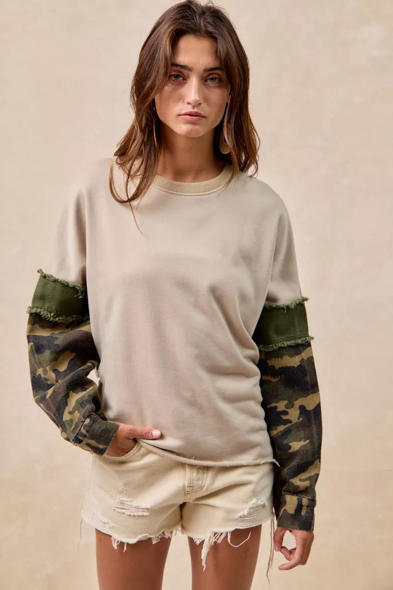 BiBi Camo Sleeve French Terry Top with Frayed Edge | Daverri Fashions