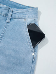 High Rise Barrel Relaxed Patch Pocket Jeans with black smartphone in pocket