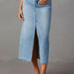 Light-wash denim midi skirt with front slit and frayed hem