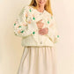Cream-colored knit Davi & Dani cardigan with cactus embroidery