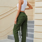 High-waisted olive green cargo pocket jeans with drawstring waist