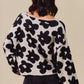 Black and white floral cropped sweater in soft textured knit