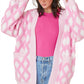 Pink and white diamond-patterned open front pocketed knit cardigan