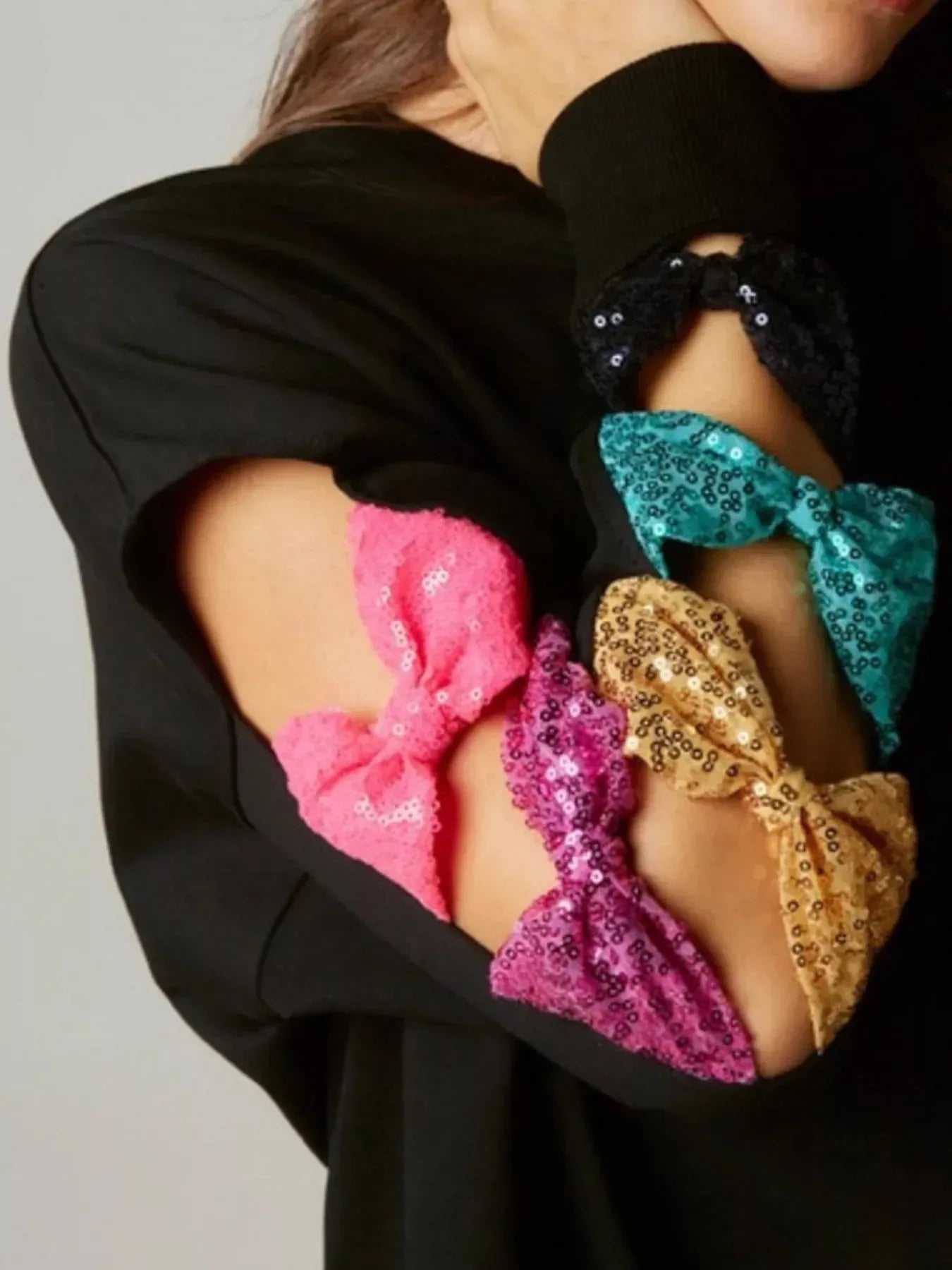 Sequin Bow Cutout Round Neck Sweatshirt - DAVERRI FASHIONS
