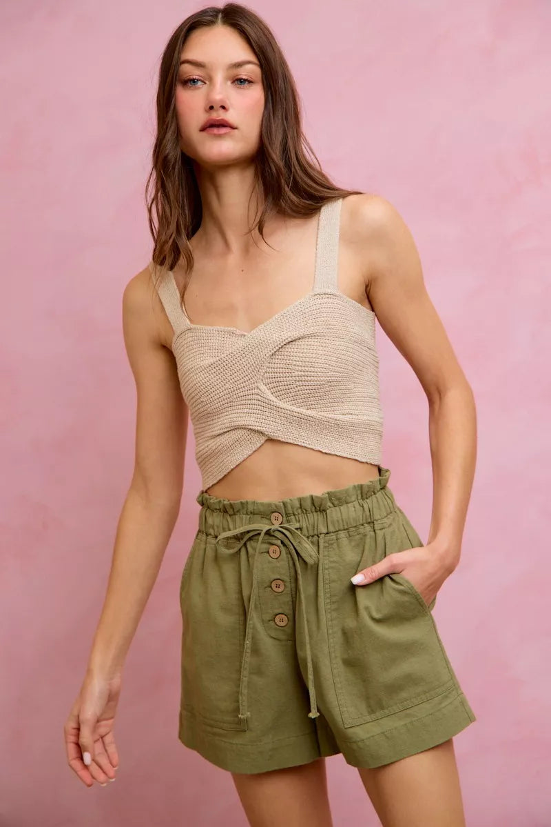 Beige crocheted crop top with twisted front on SO ME twill shorts