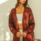 Cozy ribbed-knit red BiBi Metallic V-neck cardigan with shimmer