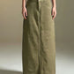 Raw hem maxi denim skirt in olive green with wide-leg straight front and button closure