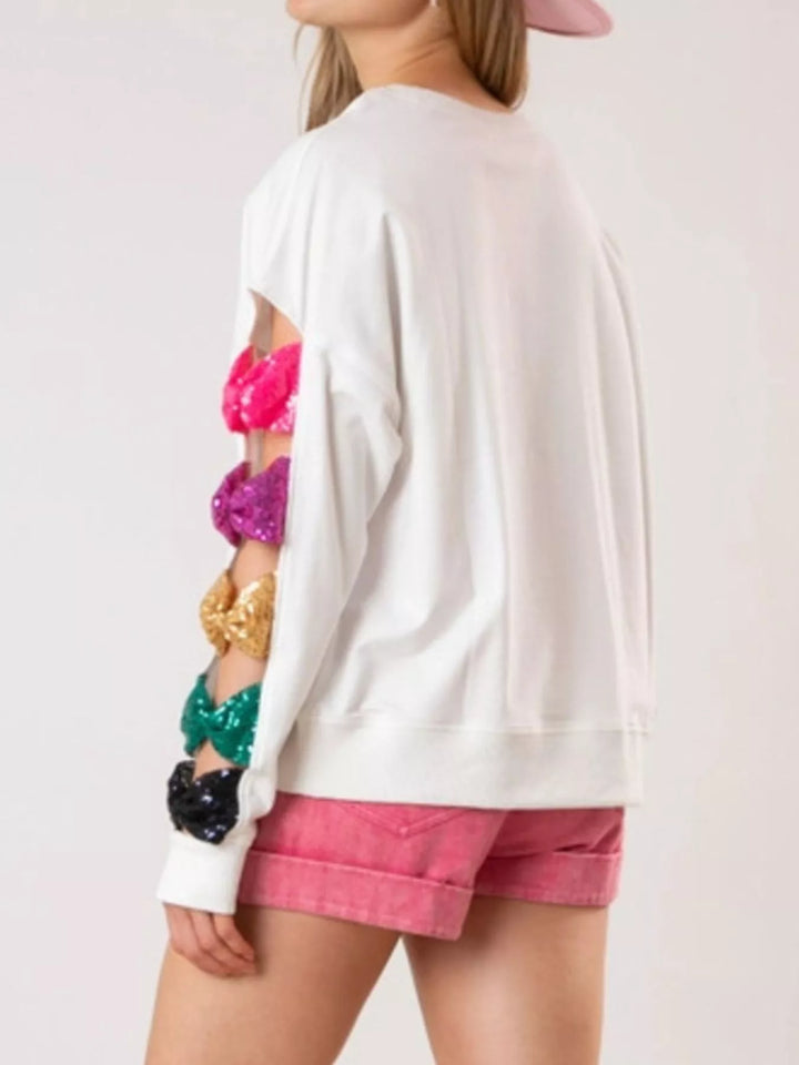 Sequin Bow Cutout Round Neck Sweatshirt | Sweatshirts Daverri Fashions