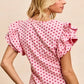 BiBi pink knit top with red heart pattern and ruffled sleeves