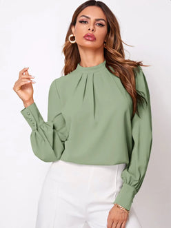 Soft sage green ruched mock neck long sleeve blouse