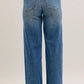 Judy Blue mid-rise straight jeans back: blue denim, beige waistband, brown leather patch