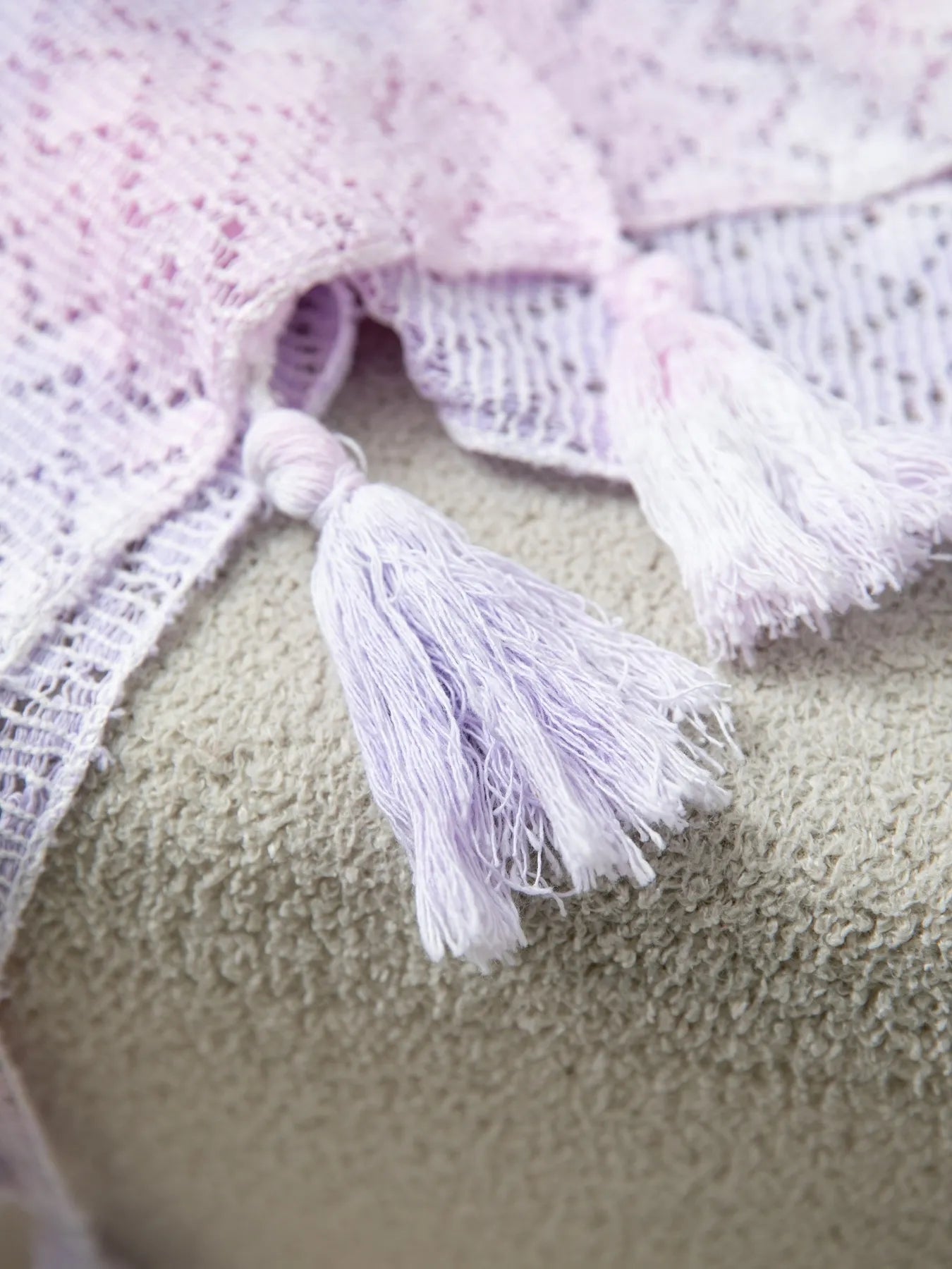 Delicate lavender Daverri openwork tassel gradient knit shawl