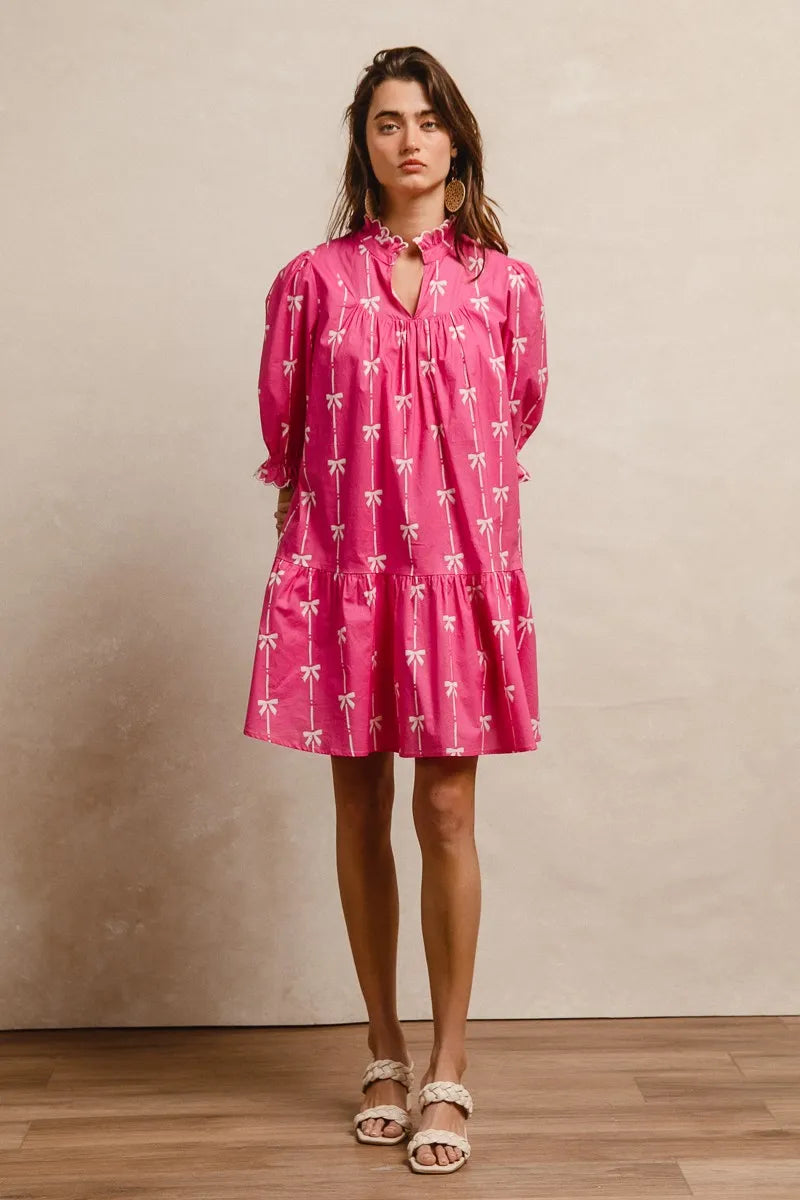 Vibrant pink BiBi ribbon pattern dress with white bows, scallops, long sleeves