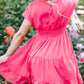 Vibrant pink smocked V-neck cap sleeve mini dress