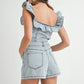 MABLE Off Shoulder Ruffle Detail Denim Romper Rompers
