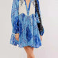 Printed tie neck long sleeve boho mini dress with blue white floral embroidery