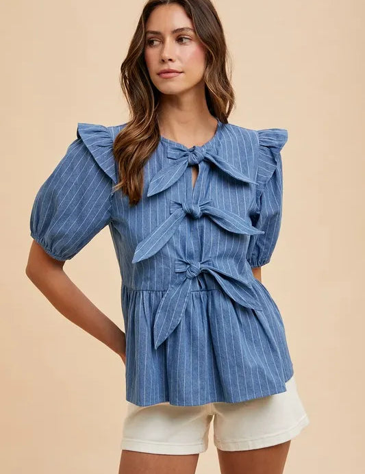 Annie Wear Stripe Front Bow Denim Peplum Blouse | Daverri Fashions