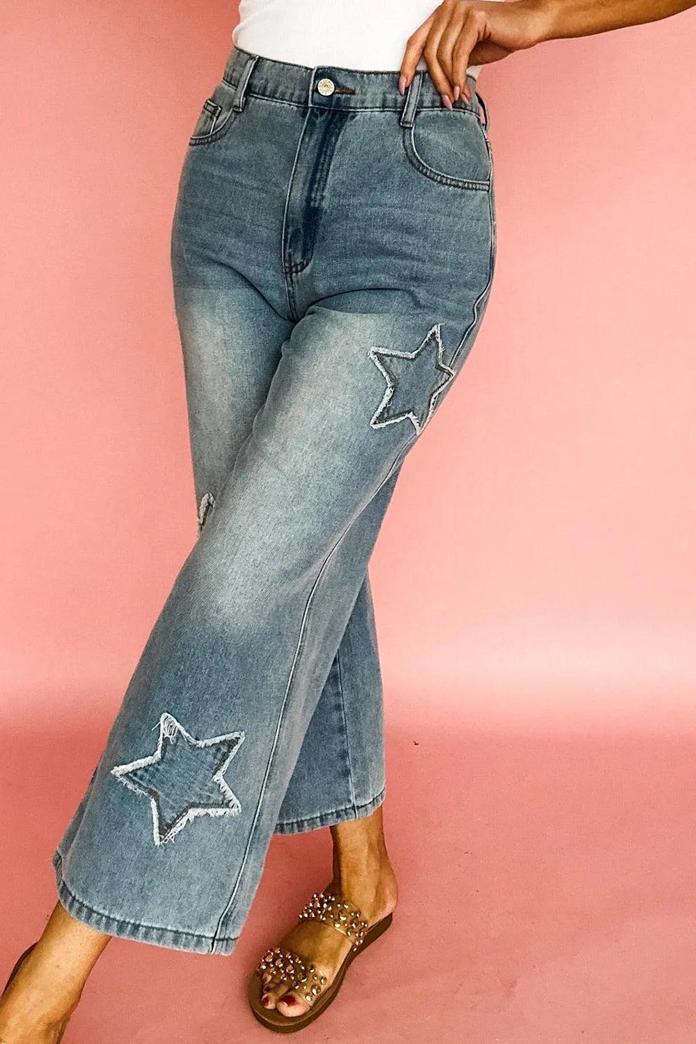 Star embroidered high waist wide leg light-wash denim flare jeans
