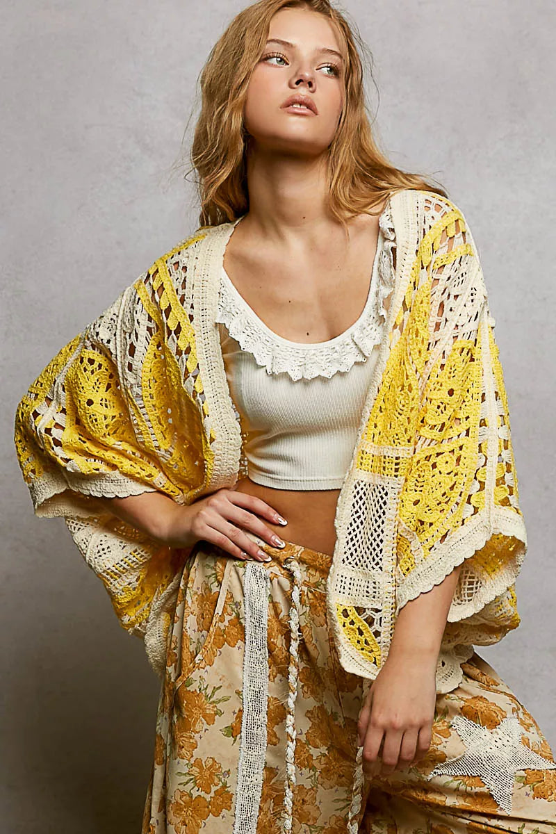 Vibrant yellow and cream POL open front crochet kimono with scalloped lace edge over white crop top