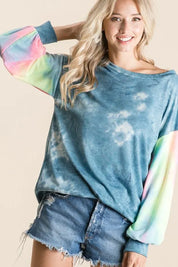 BiBi tie-dye French terry top with bell sleeves and distressed denim shorts