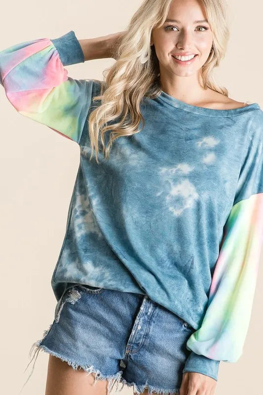BiBi tie-dye French terry top with bell sleeves and distressed denim shorts