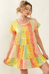 BiBi Leopard Short Sleeve Tiered Dress in vibrant yellow, orange, green patchwork with leopard accents